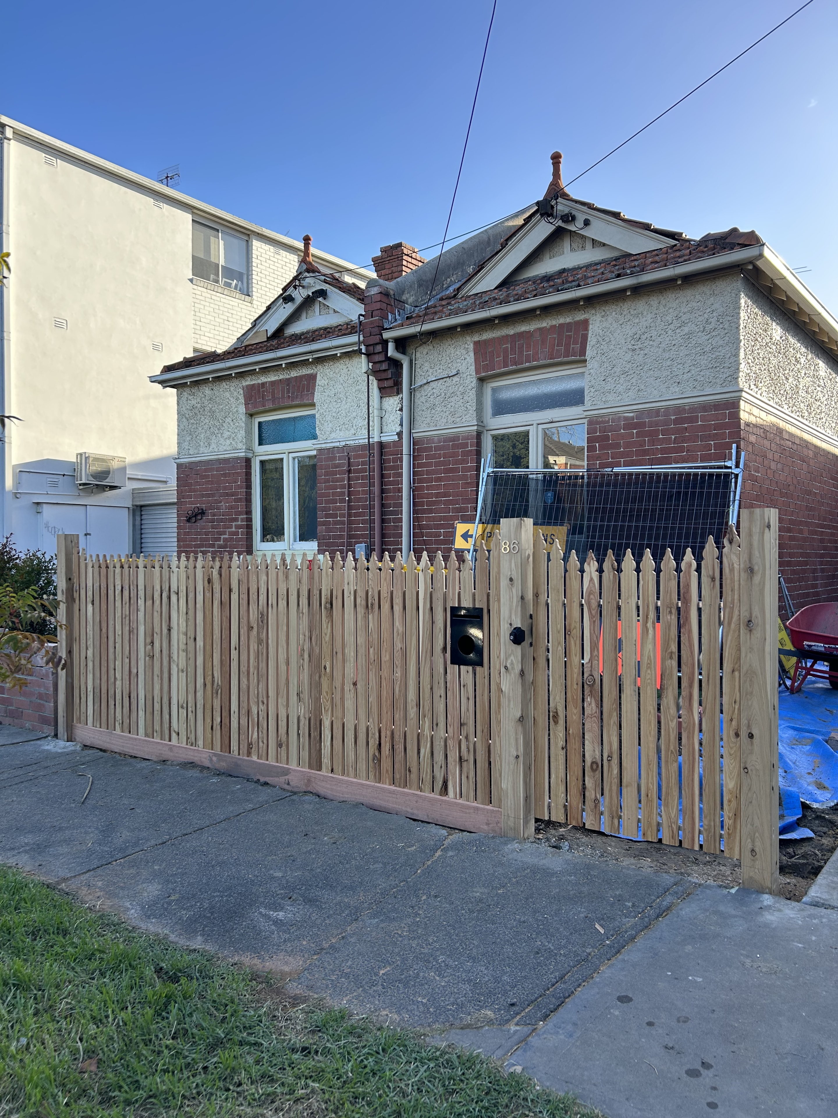 Timber picket fence and gate installation